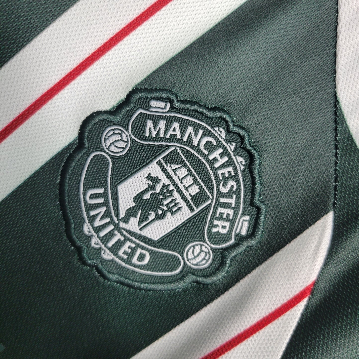 Manchester United 2024/25 Away Jersey – Green Stripe Edition
